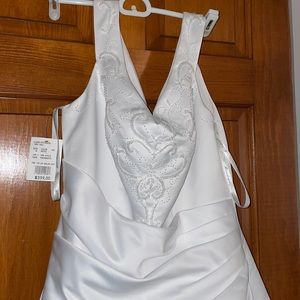 Size 14 wedding dress with tags. Beautiful dress!